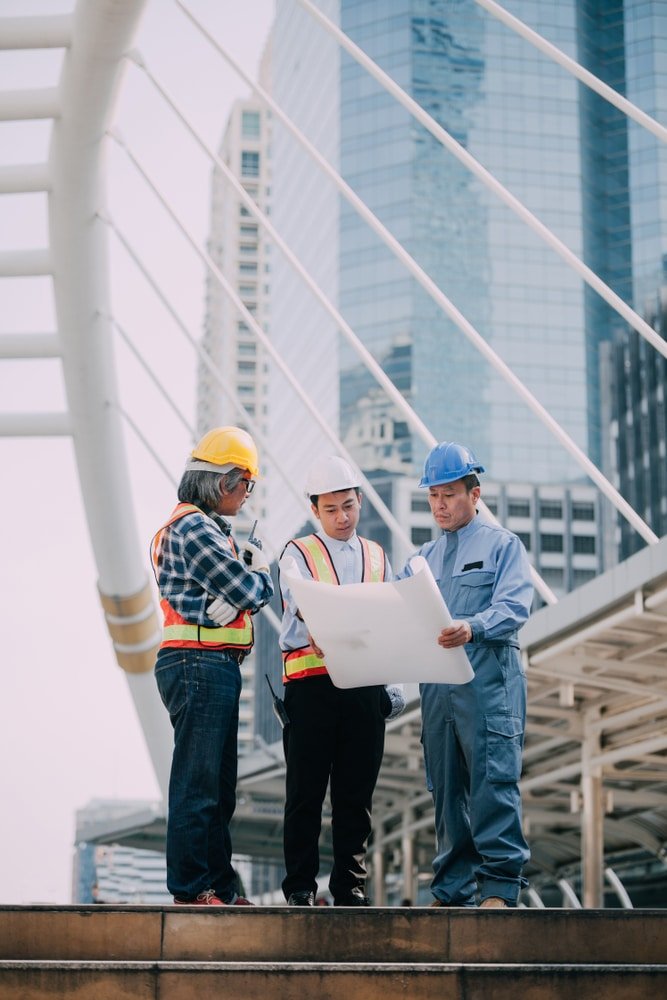 Engineer,Meeting,discussion,With,Construction,Blueprint,On,Site,Work,business,Man,Meeting